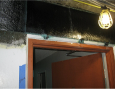 CFRP spandrel over a unit door