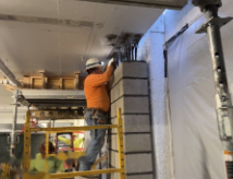 CMU wall doweled into the slab above