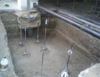 Footing reinforcing and micropiles in the trench