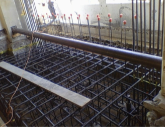 New footing cage tied to an existing column