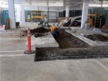New footing excavation in the slab on grade